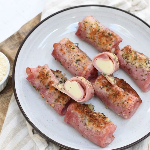 Diabetic-Friendly Air Fryer Crispy Ham and Cheese Bites Air fryer crispy ham and cheese bites on a white plate.