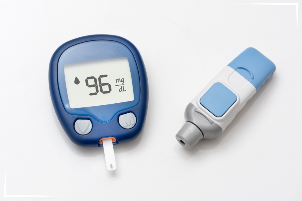 A Blood sugar meter showing 96.