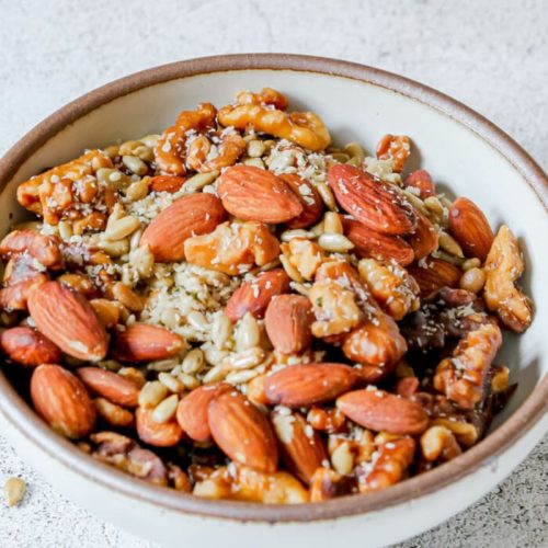 Nut & Seed Granola in a white bowl.