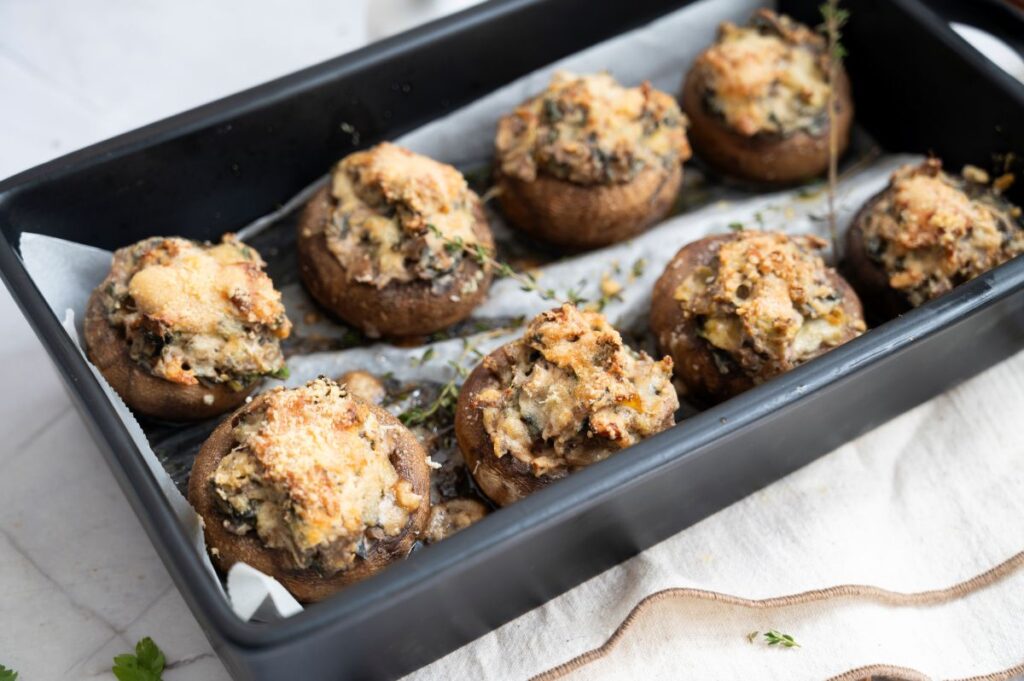 Stuffed Mushrooms in a pan.